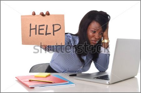 capture-frustrated-woman-at-computer-with-help-sign-shutterstock-255057562